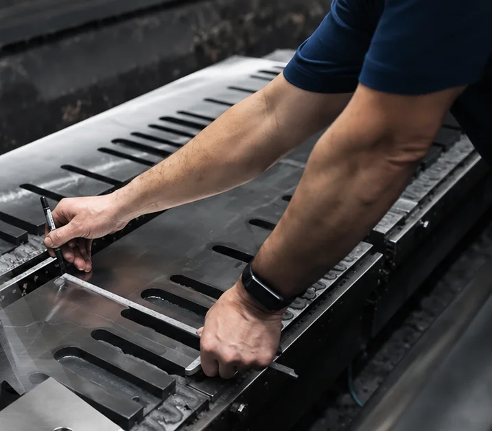 L.A. Grinding technician measuring an industrial blade